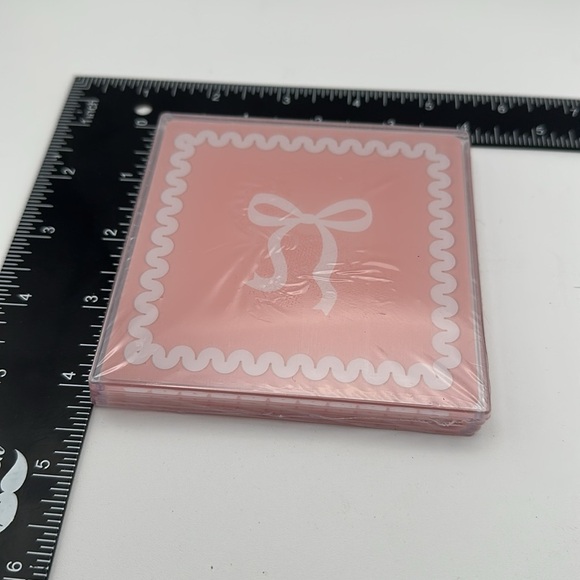 Set of 4 plastic bow coasters and one hot pink ceramic bow trinket dish - Picture 7 of 7
